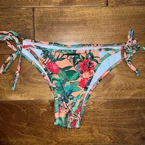 Express cut out, jungle print swimsuit bikini bottoms, size medium​​​​​​​